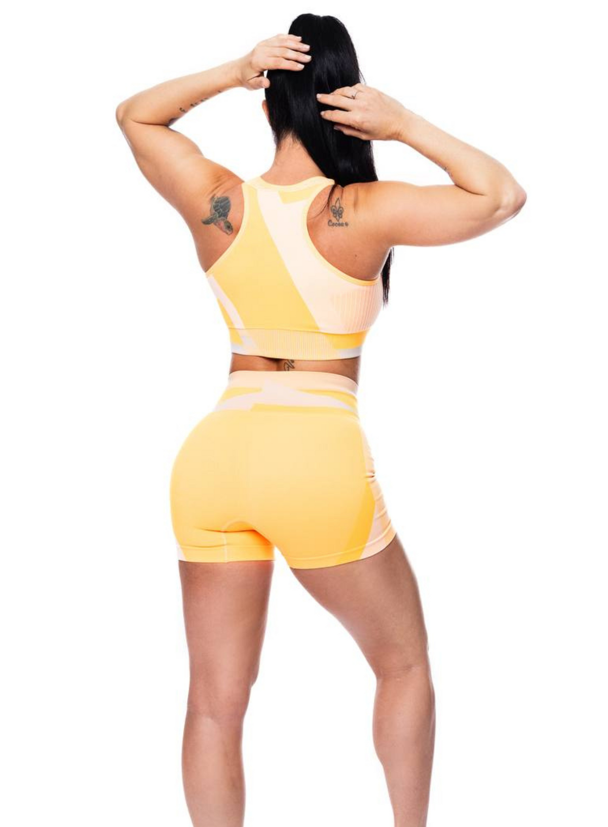 back view of sandstone orange shorts