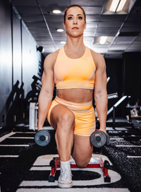 sandstone neon orange sports bra