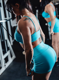 boca blue workout shorts in gym